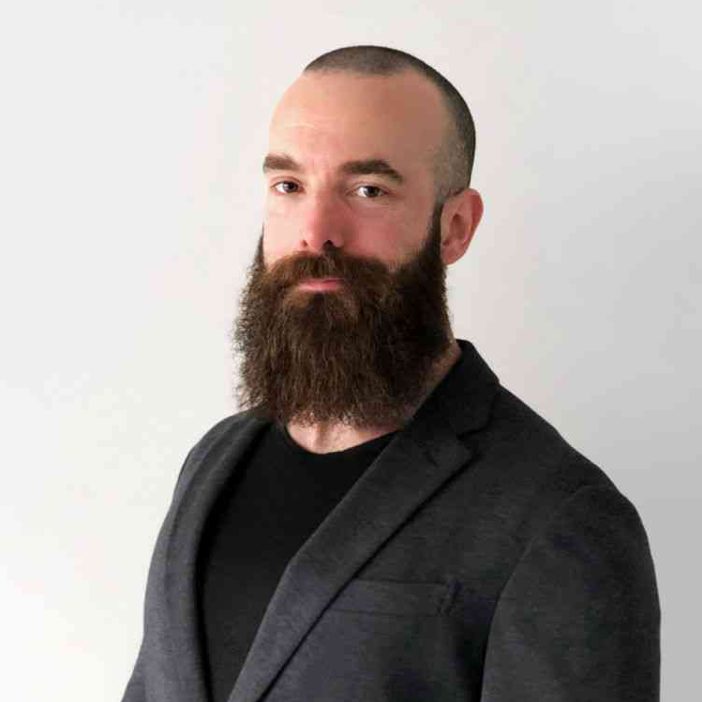 A photograph of Adam Drake.