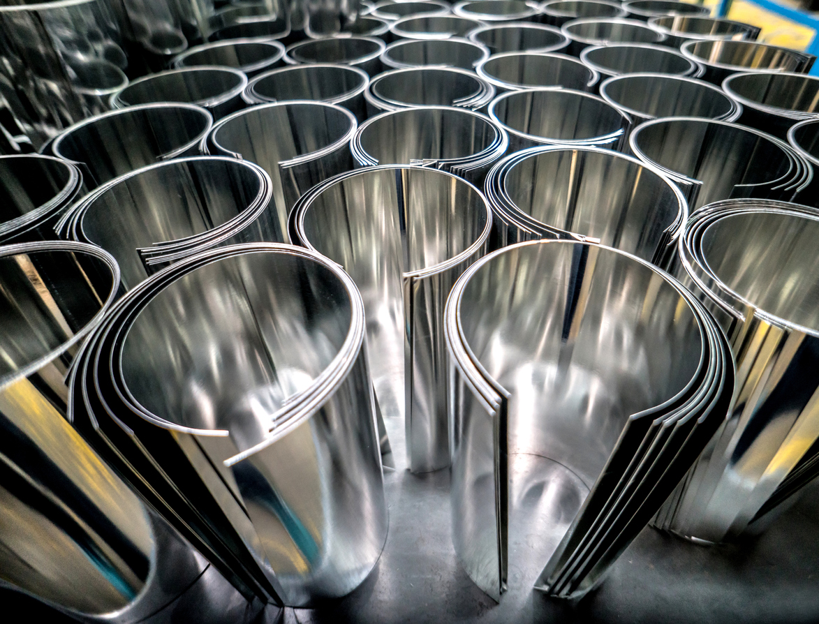 Many rolled metal sheets.