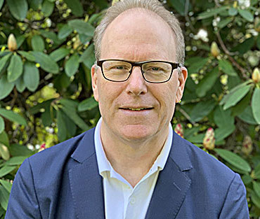 A photograph of Drummond Reed.